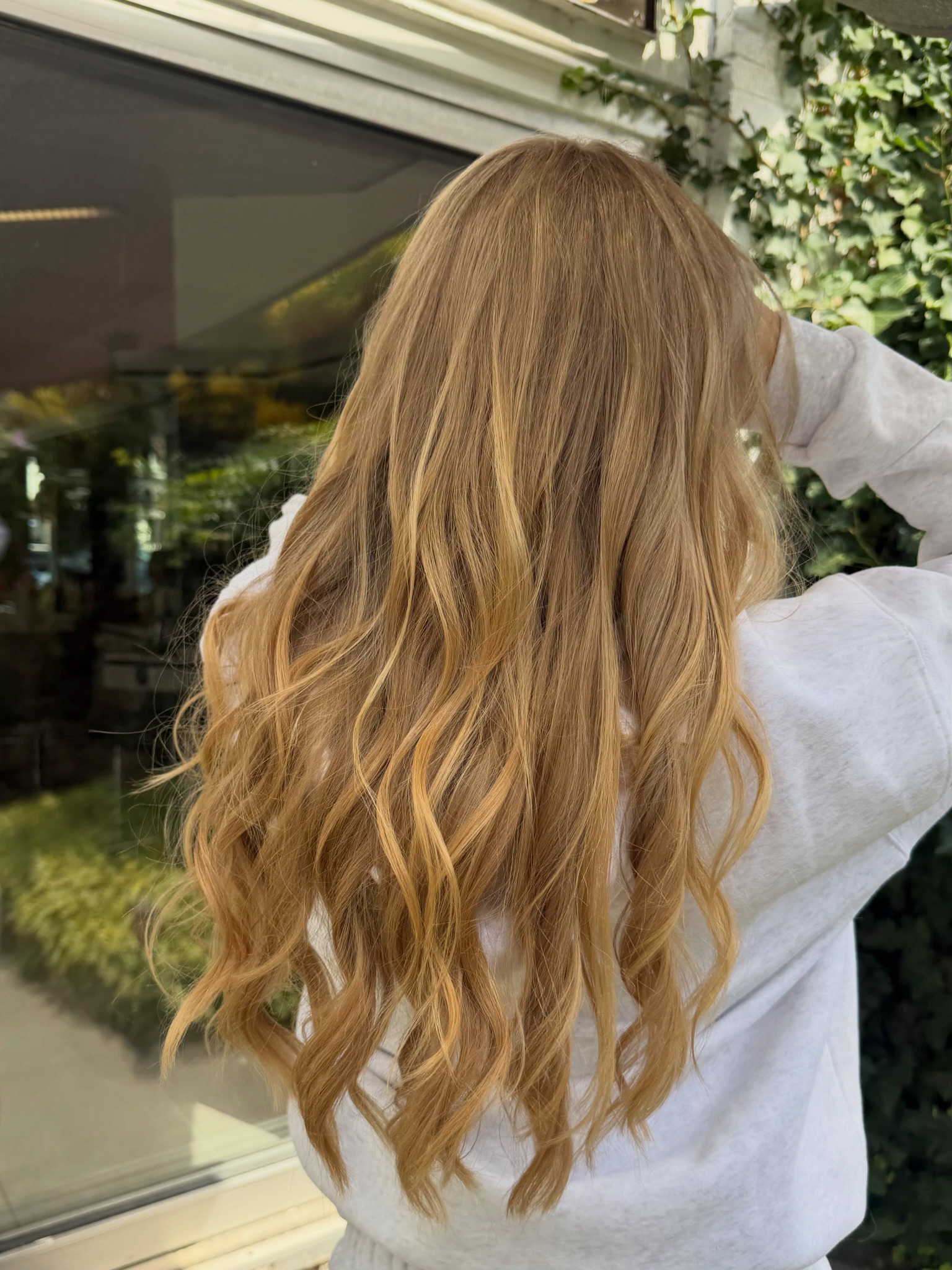 Kapsel met lang blond golvend haar